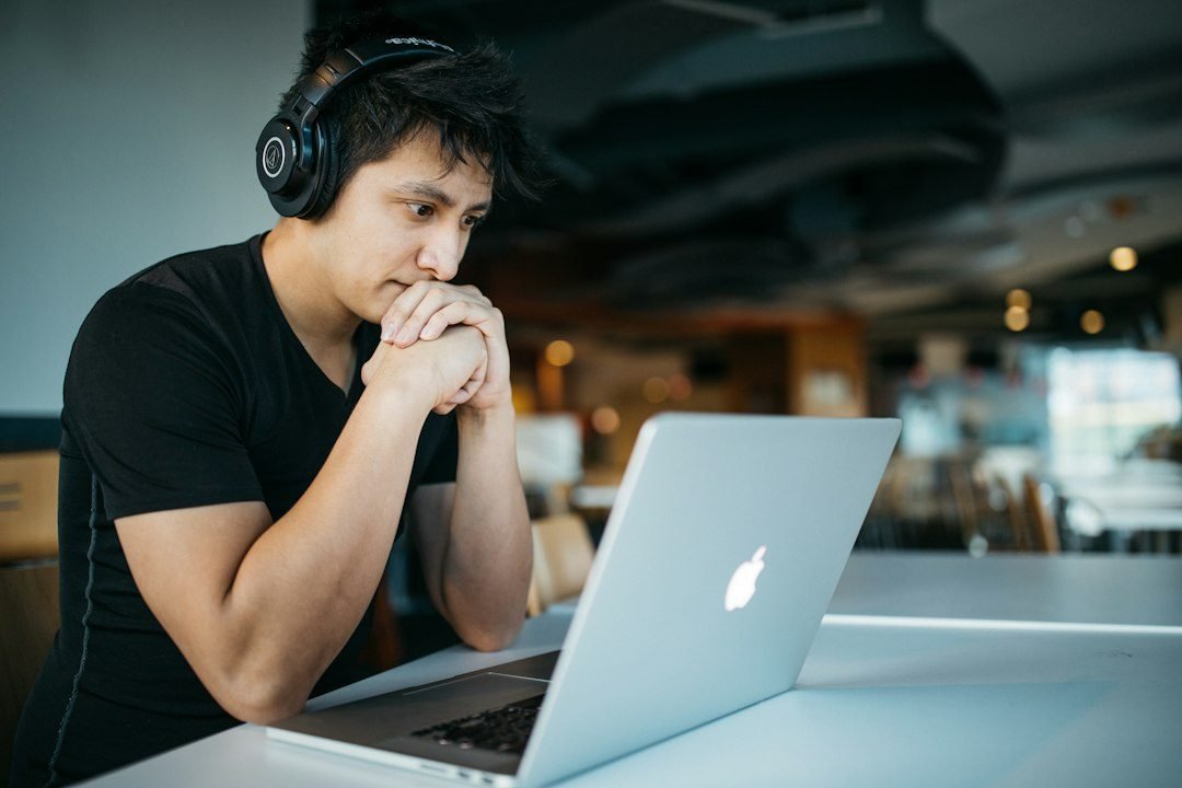 Teenager studying on a laptop, illustrating OpenAI's new college-planning feature